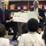 Education Sec. Duncan and Rep. Scott read to students.